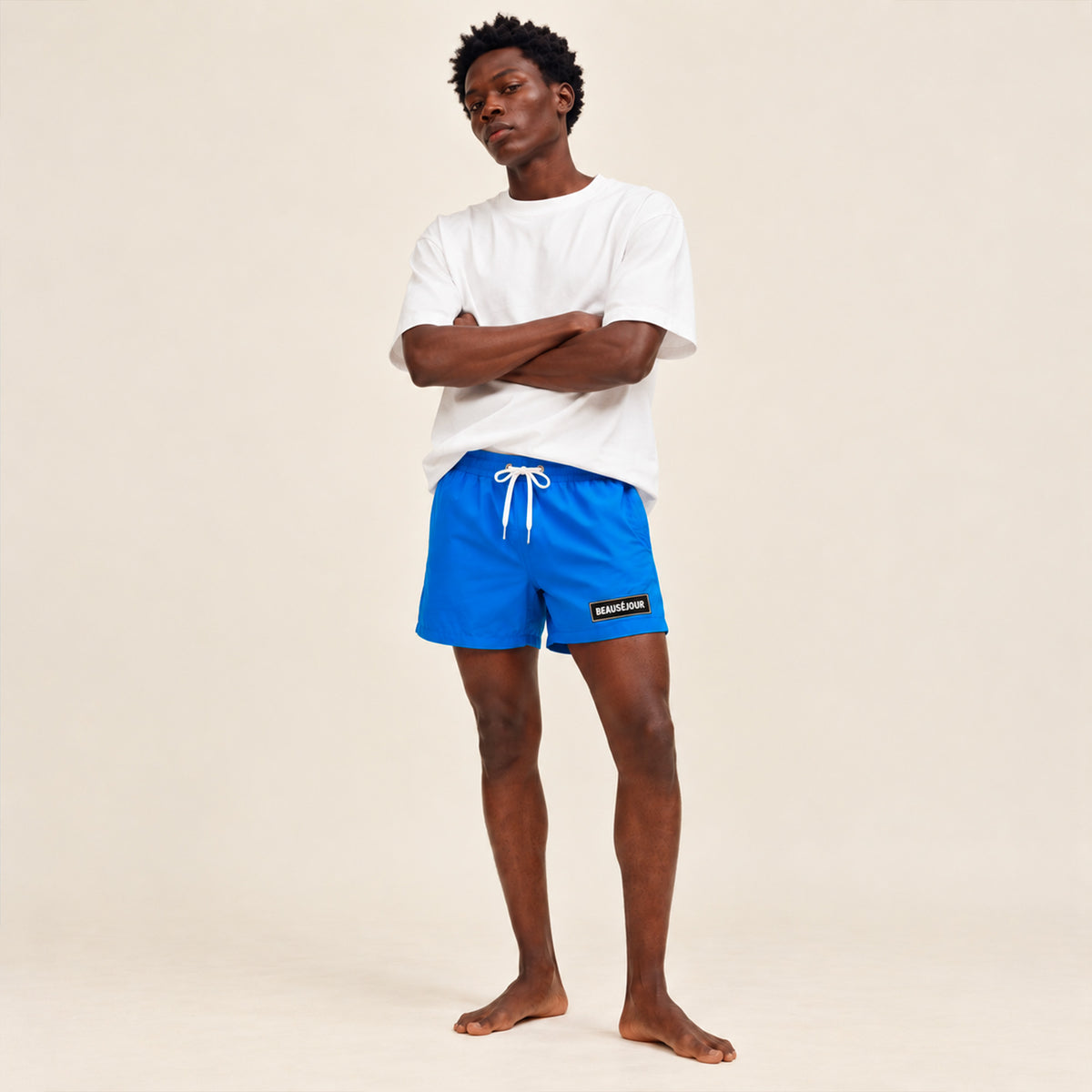 Maillot de bain bleu pour homme. Imrpimé patch caoutchouc sur l'avant.