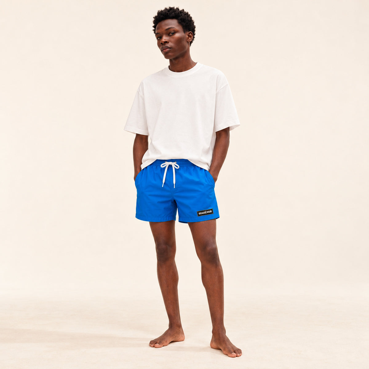 Maillot de bain bleu pour homme. Imrpimé patch caoutchouc sur l'avant.