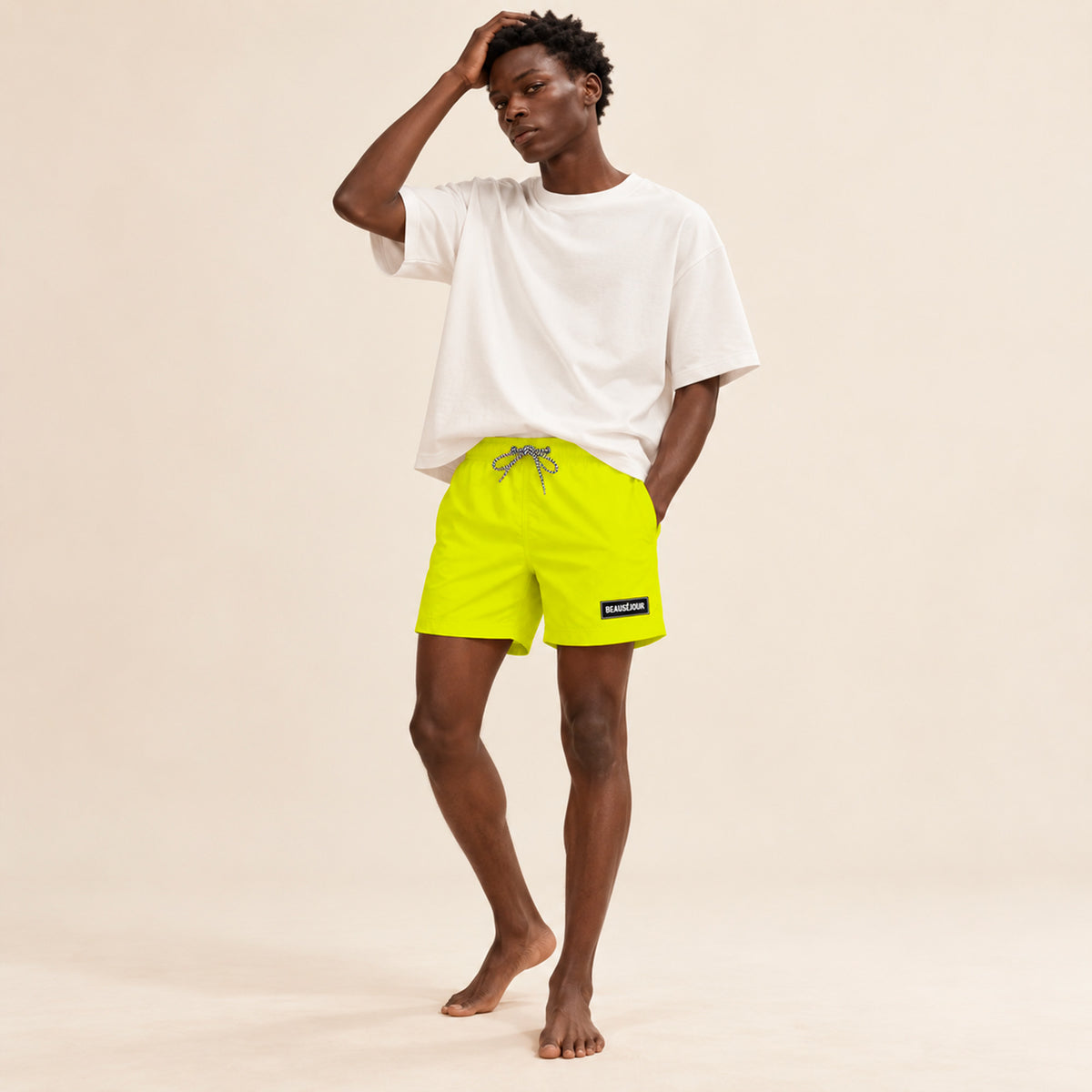 Maillot de bain jaune pour homme. Patch Beauséjour en caoutchouc signature sur la cuisse