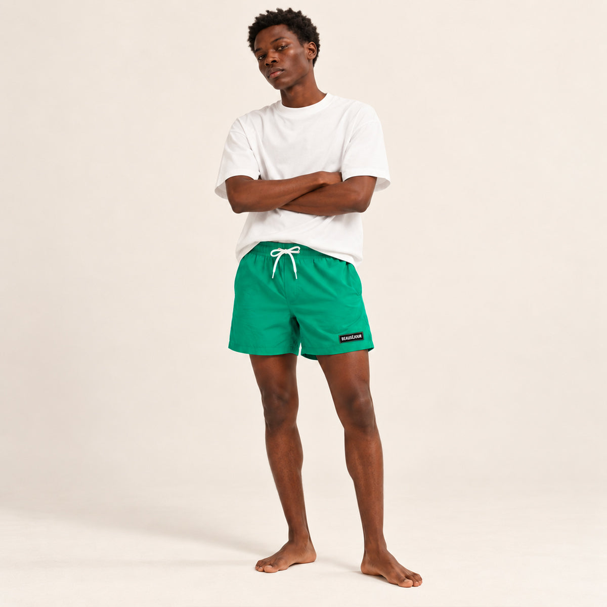 Maillot de bain vert pour homme. atch Beauséjour caoutchouc signature sur la cuisse. Vue de face.