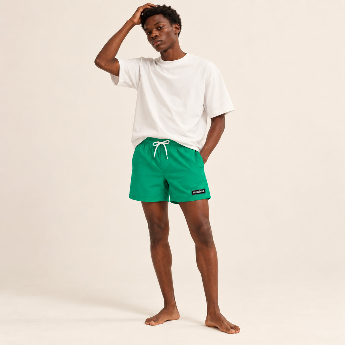 Maillot de bain vert pour homme. atch Beauséjour caoutchouc signature sur la cuisse. Vue de face 3.