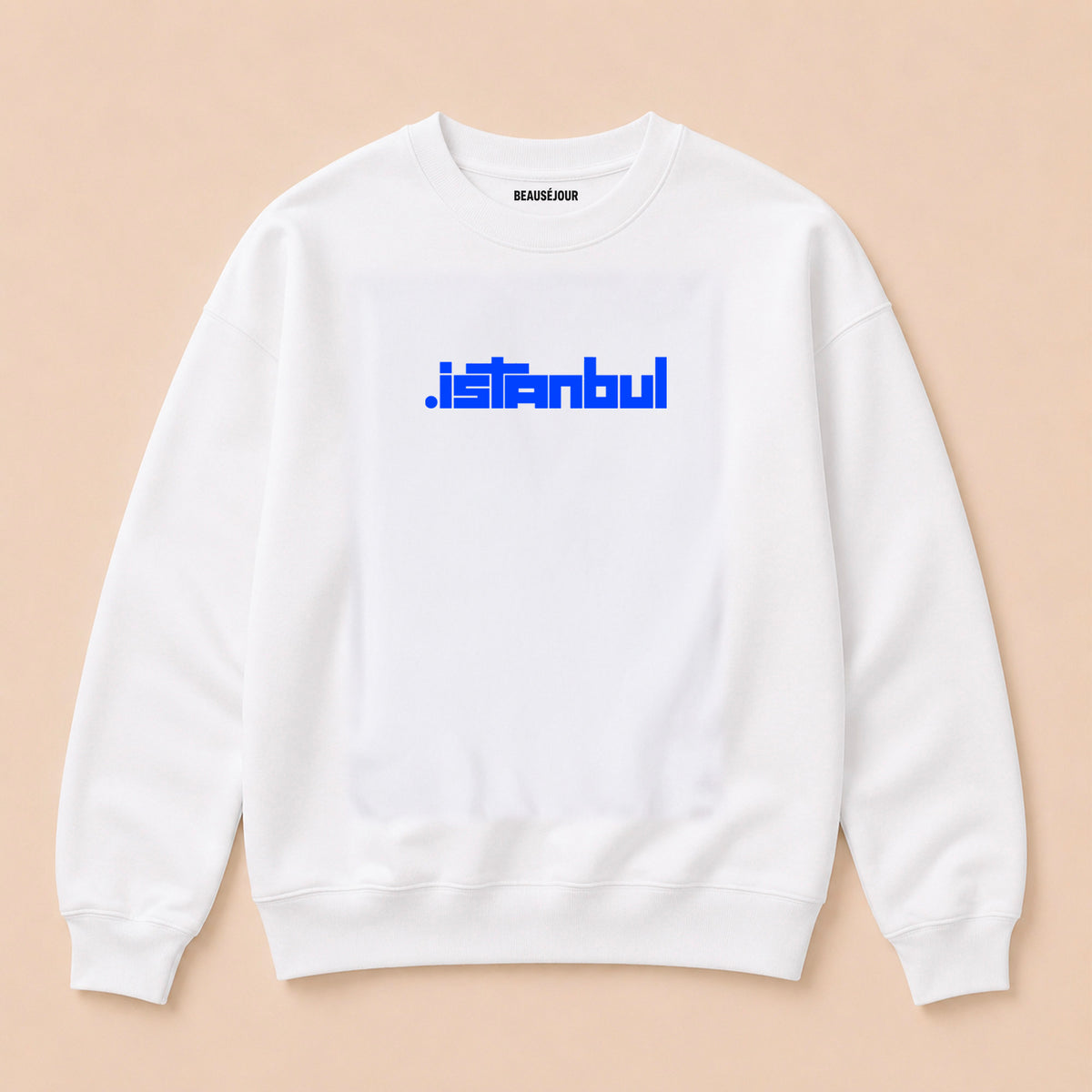 Sweatshirt Istanbul Beauséjour Orient Express, coloris blanc, molleton brossé premium 350 g/m², logo Istanbul bleu côté cœur et typographie signature au dos, packshot vue de face.
