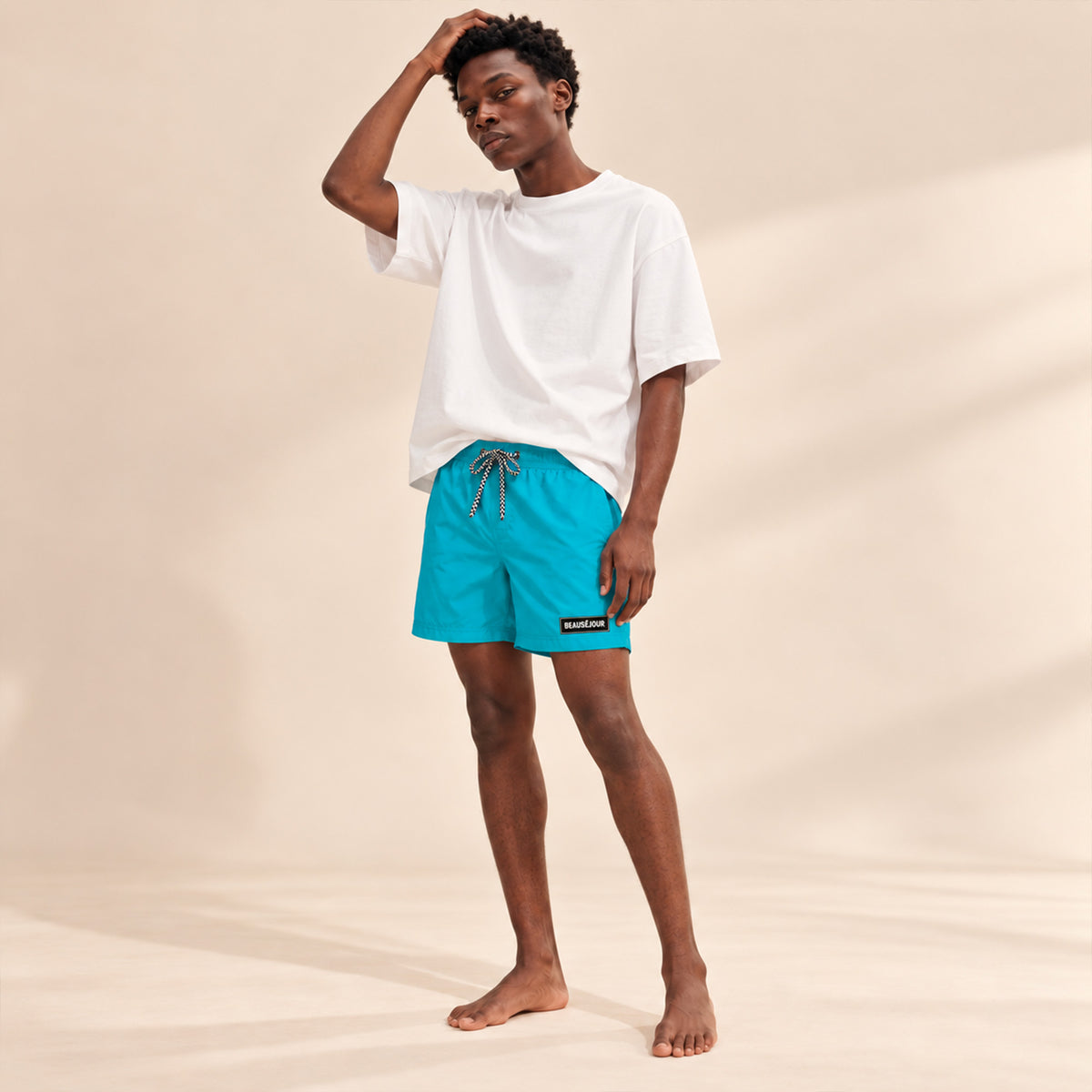 Maillot de bain turquoise pour homme. Patch beauséjour caoutchouc sur la cuisse. Vue 3.