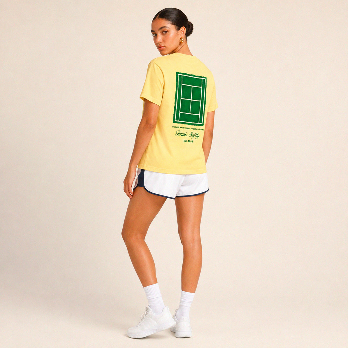 T-shirt Tennis Femme Beauséjour jaune, porté par une femme, vue 1.