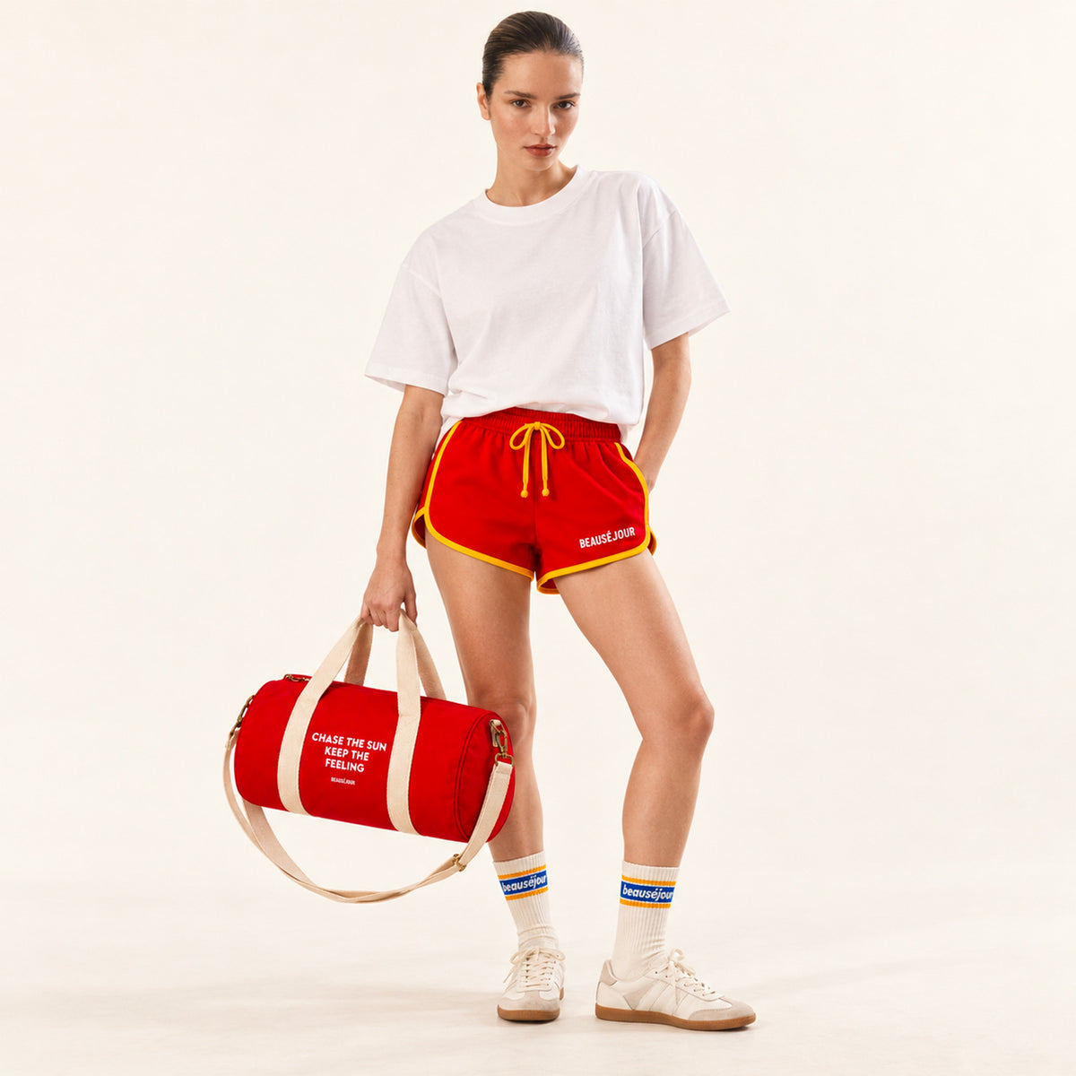 Short de sport rouge et jaune pour femme. 100% coton. 