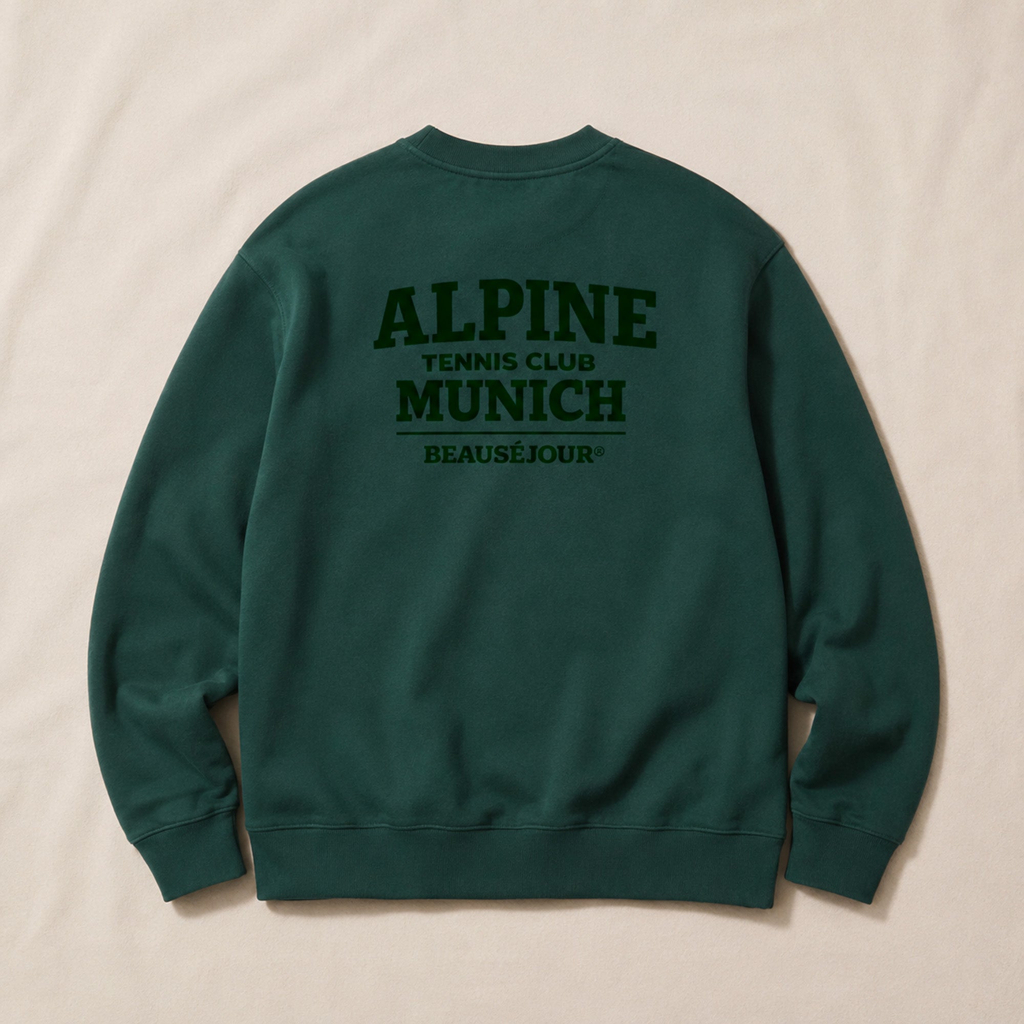 Sweat Alpine Tennis Club Munich Beauséjour® coloris vert, impression graphique dans le dos, vue de dos.