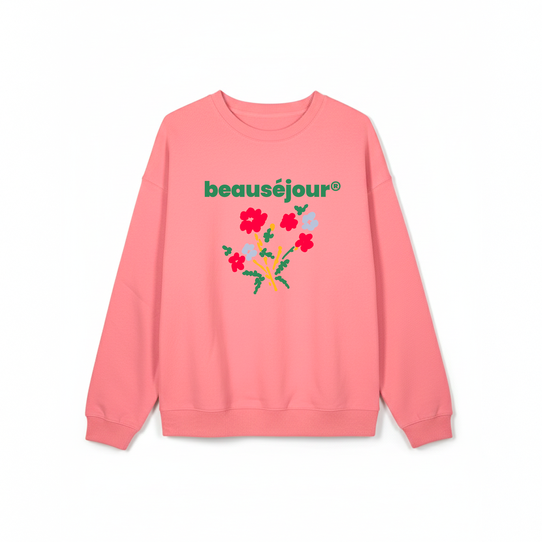 Femme portant un sweatshirt lifestyle Beausejour rose à motif floral au bord d’une piscine tropicale, marque française de vêtements lifestyle inspirés de l’été